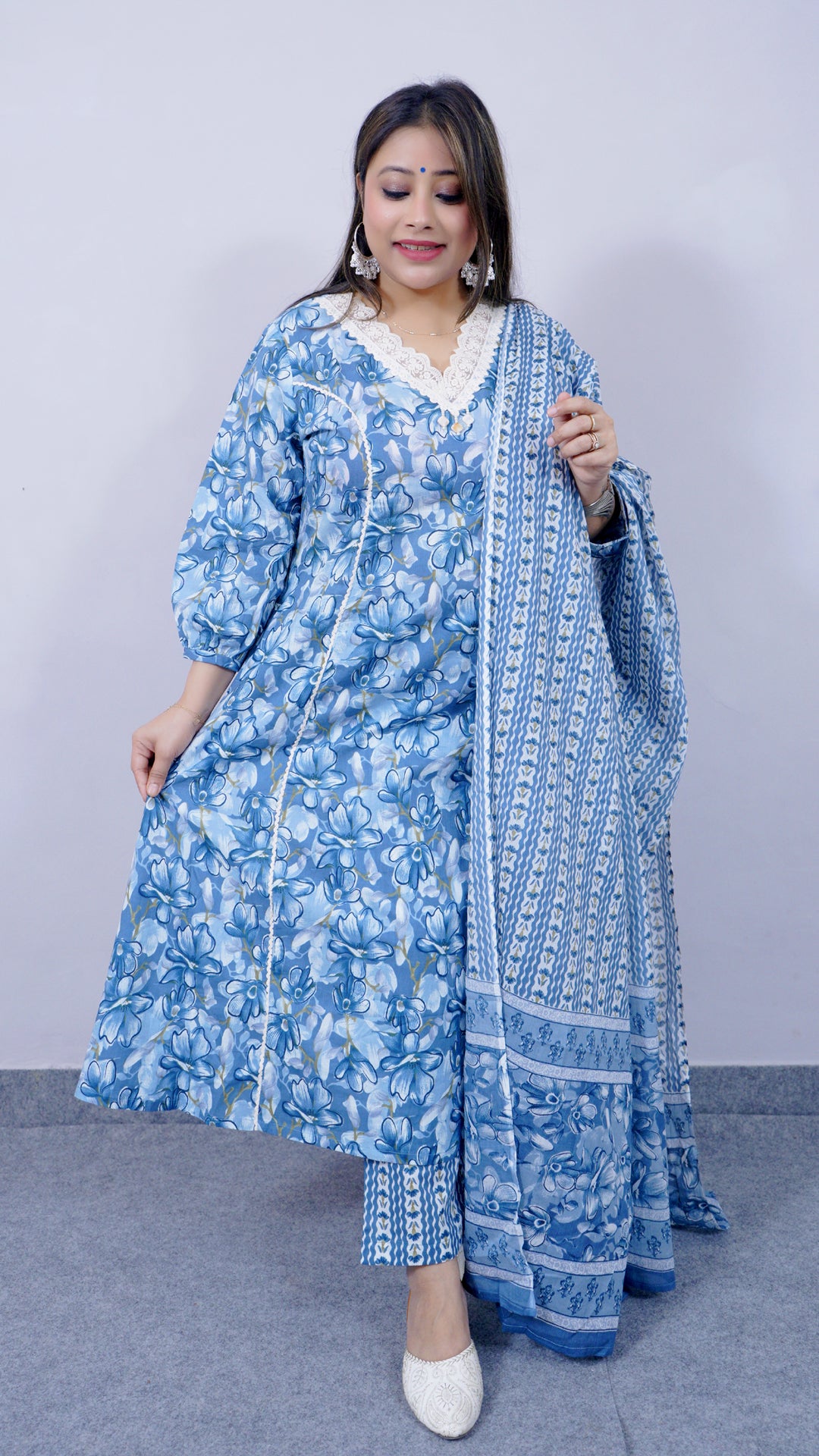 Fabric texture of blue A-line cotton kurta set with lace detailing