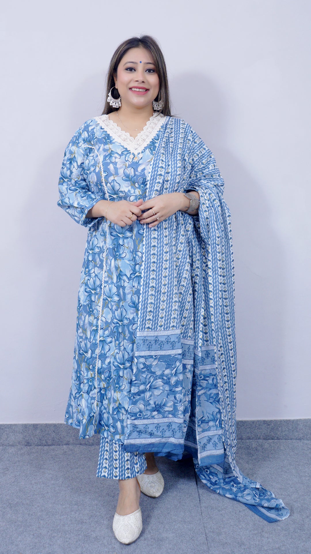 Front view of blue A-line cotton kurta set with lace detailing for women